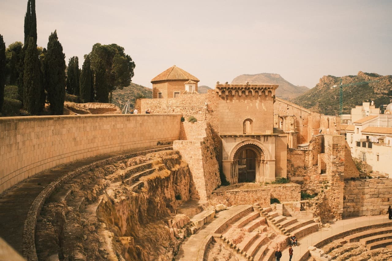 Roman ruins, warm stone amphitheater
